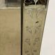 Venetian mirror with floral decoration pediment