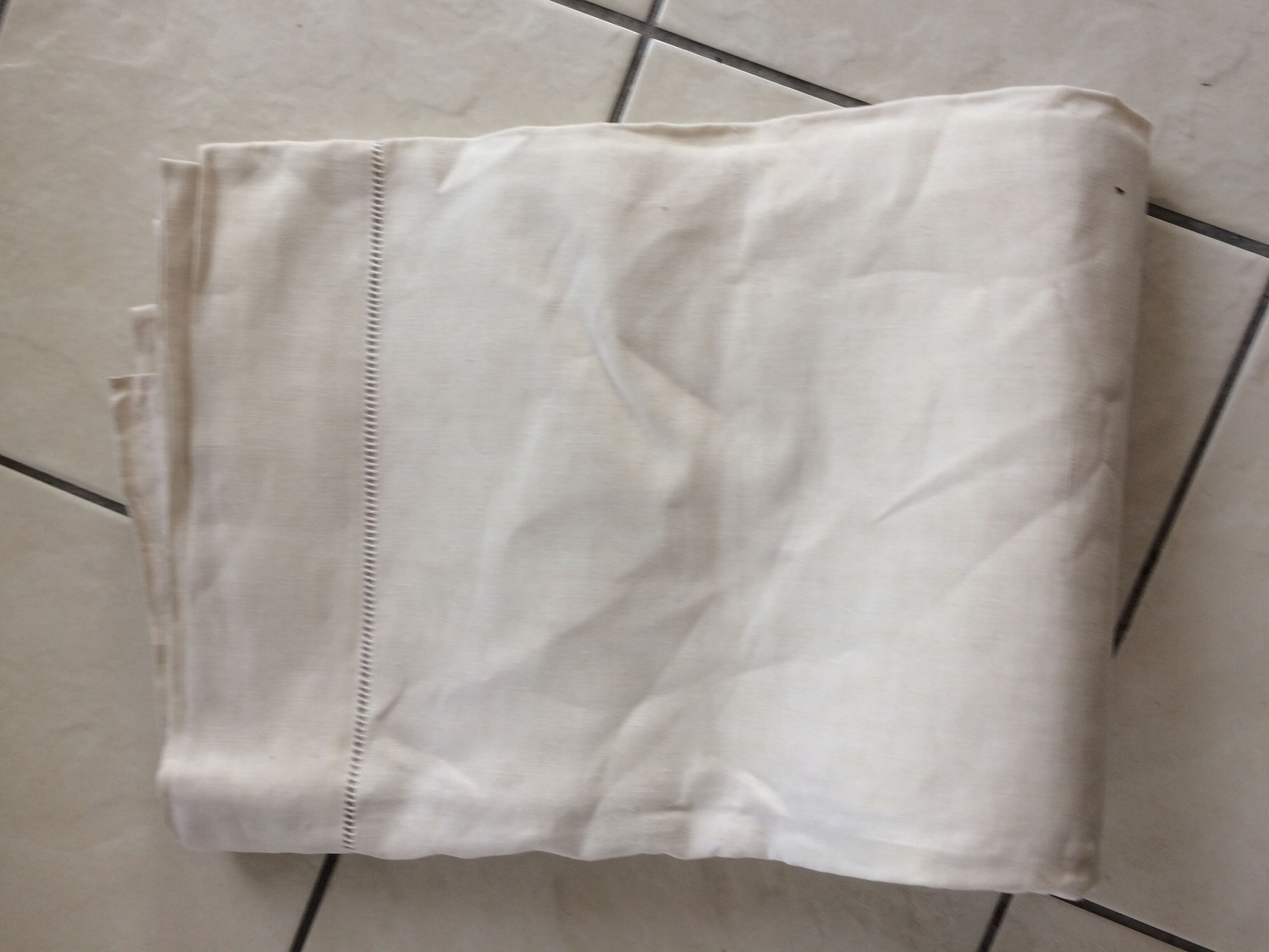 Antique linen sheet with days, embroideries and monograms worked