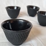 4 black cast iron teacups