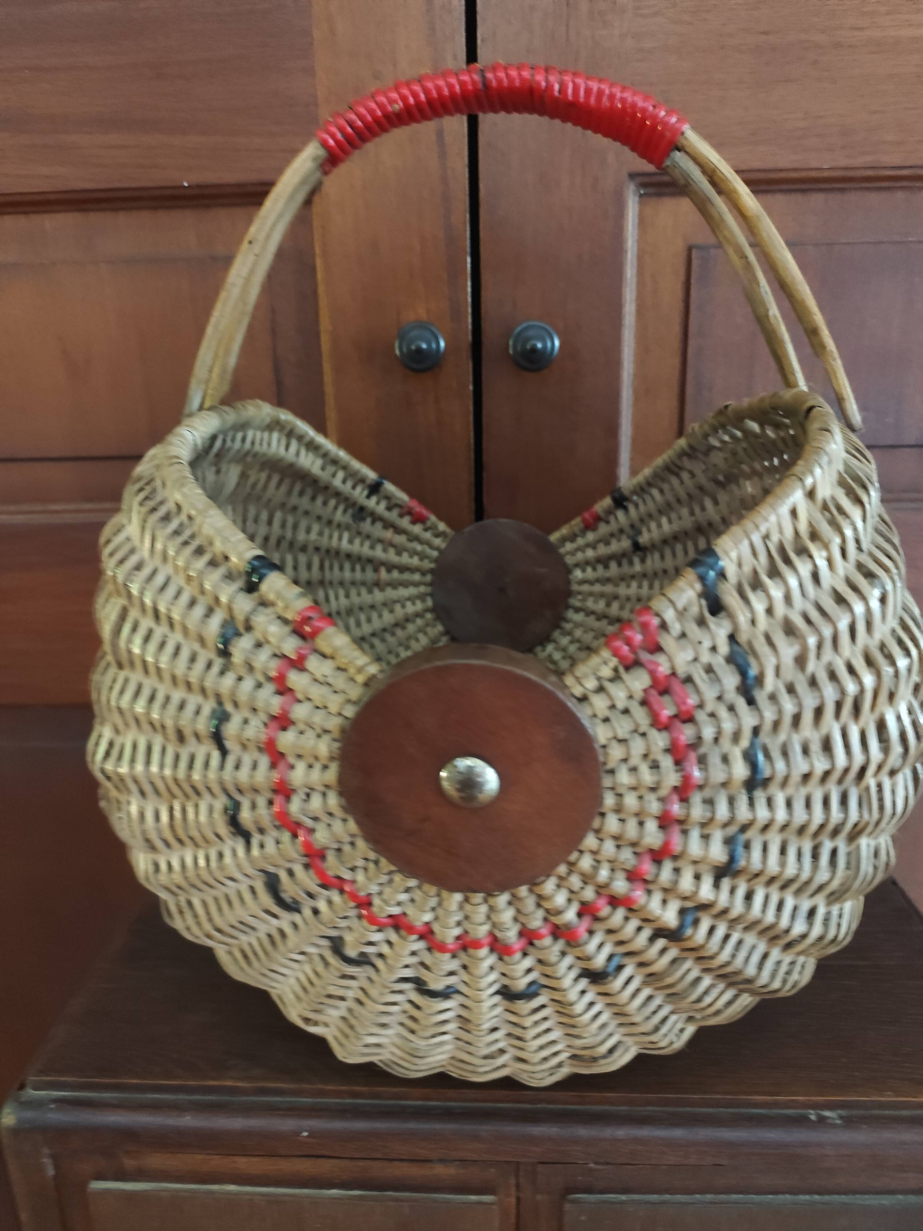 Large antique half-moon rattan basket