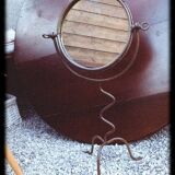 Atypical round mirror in artisanal wrought iron