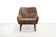 Danish design armchair in brown faux sheepskin