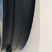 Jacques Adnet circular leather and brass mirror