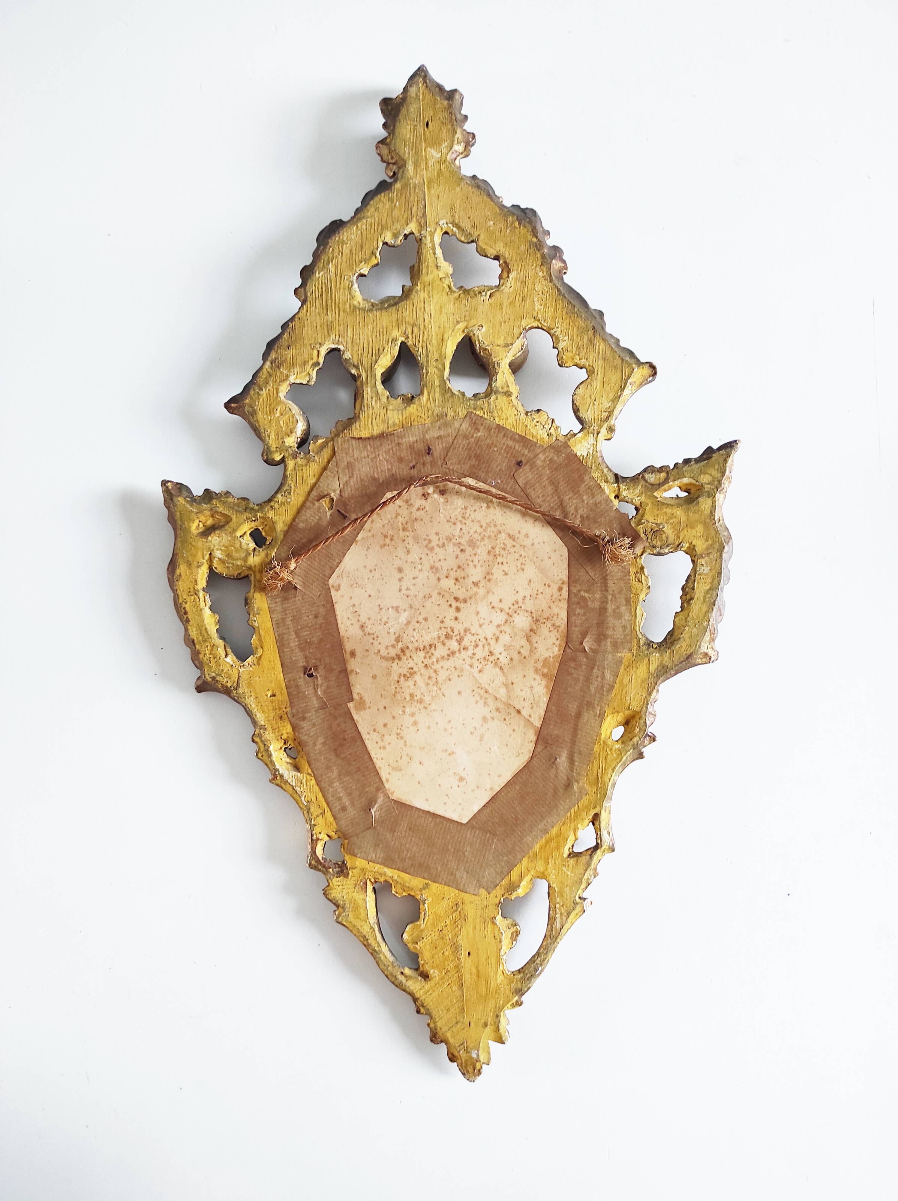 Gilded wood mirror, 56 x 32 cm