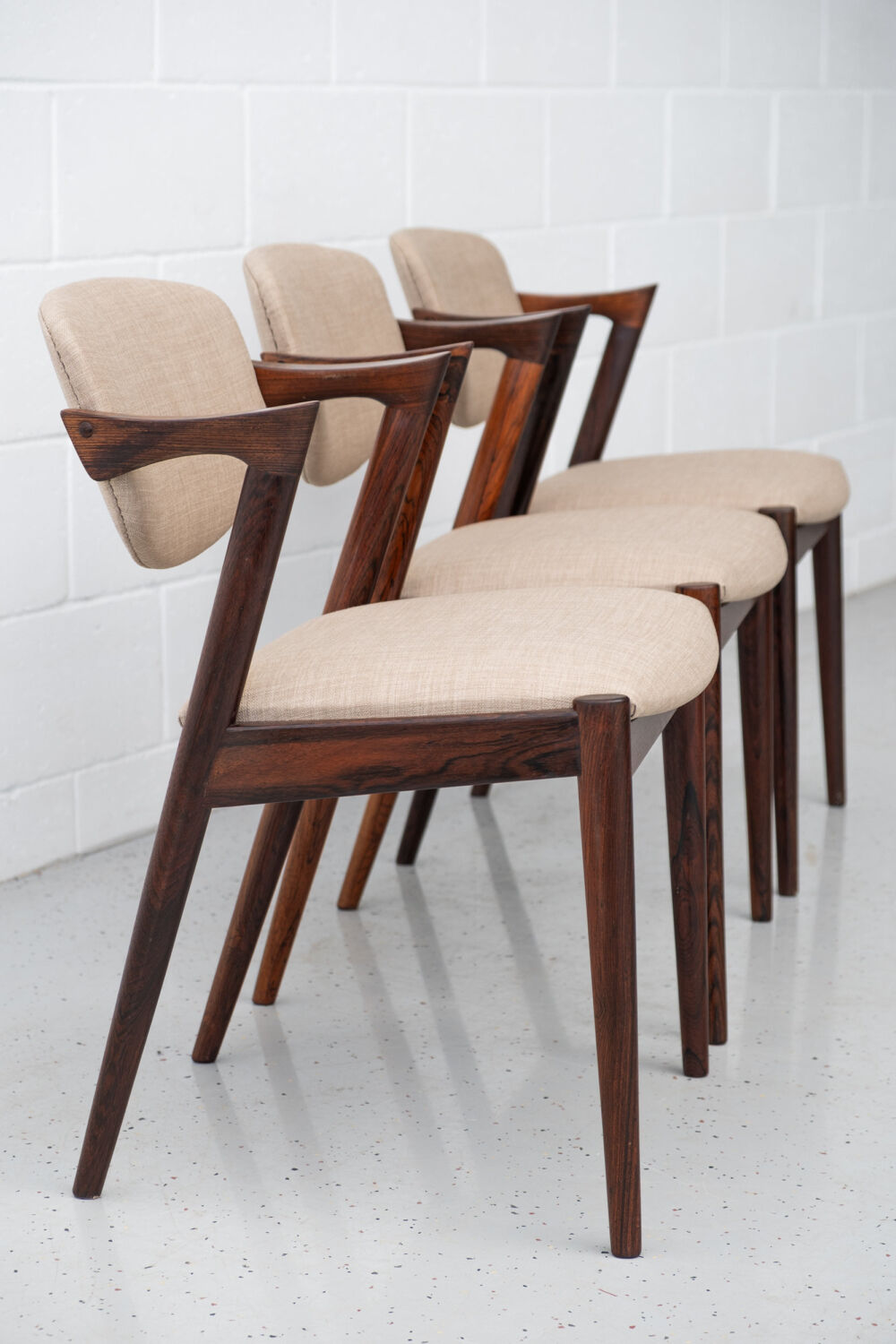 Dining chairs in rosewood, model 42, by Kai Kristiansen.