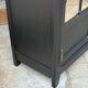 Armoire parisienne noire vitrée rénovée