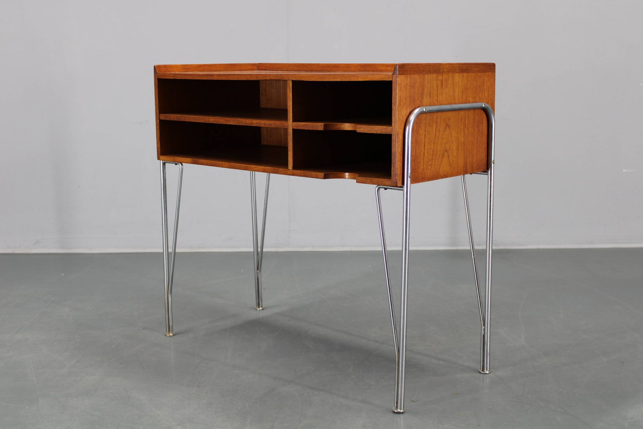 1960s Danish teak shelf cabinet with chrome plated legs