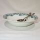 Large hollow earthenware dish of Moulin des Loups model Athens, iron earth