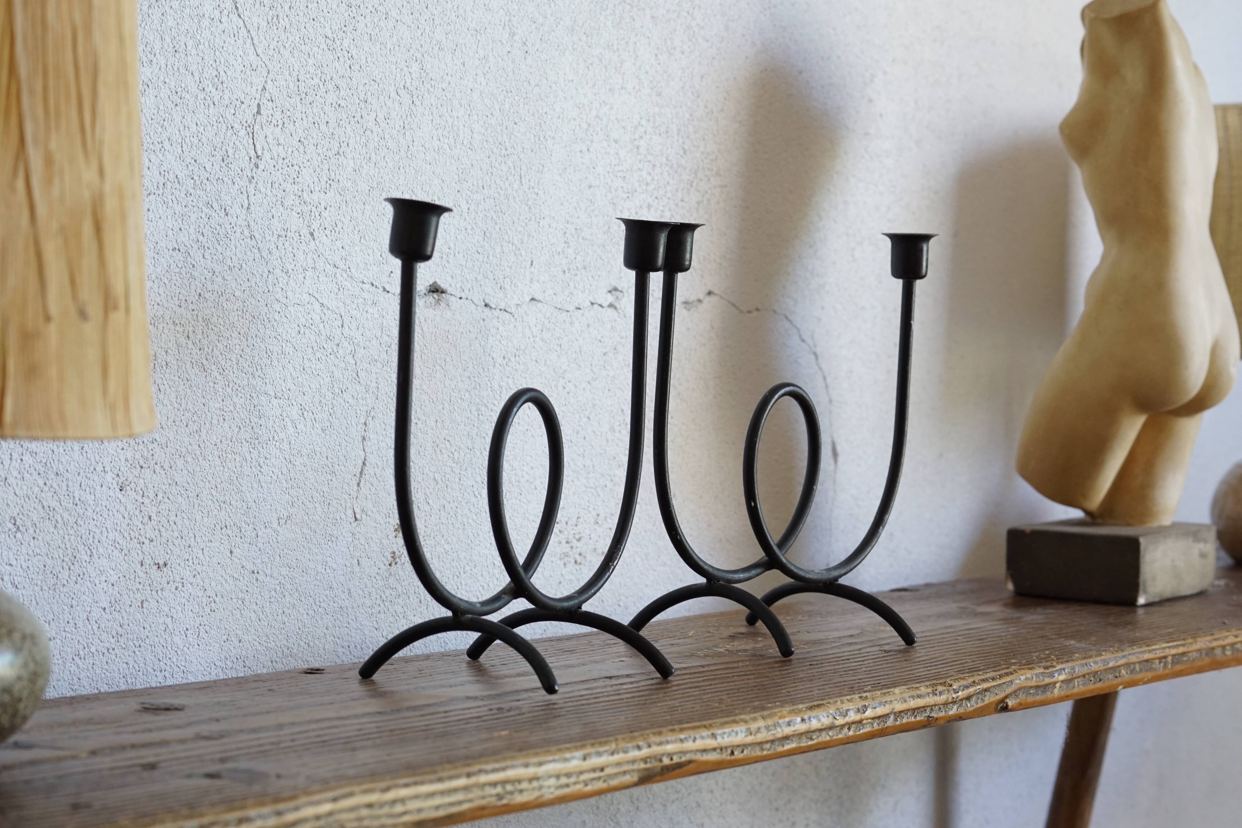 Wrought iron candlesticks