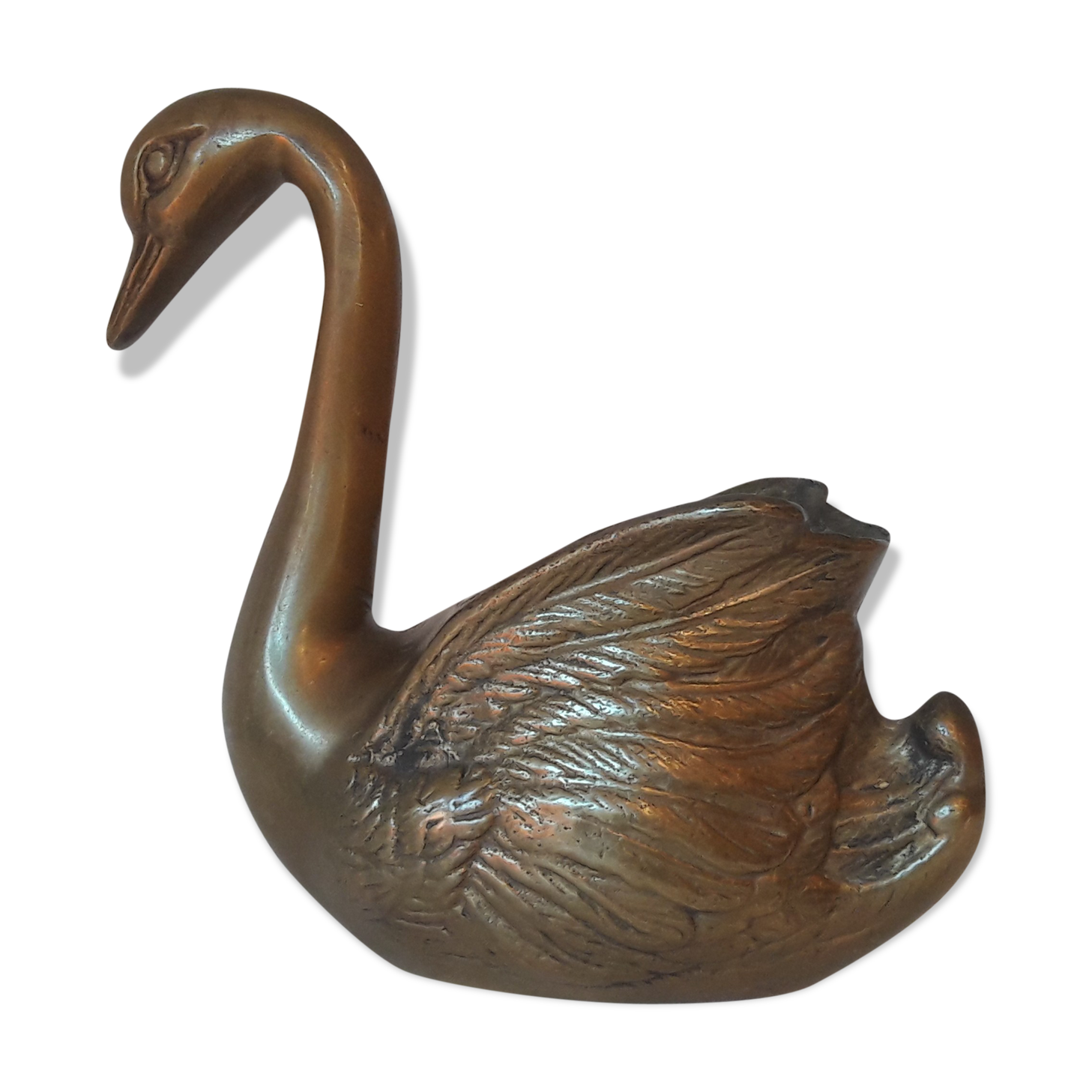 Empty brass swan pocket