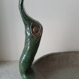 Empty pocket cup forming a bird