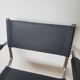 Pair of armchairs in chrome and black leather