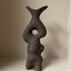 Black stoneware vase in an organic shape