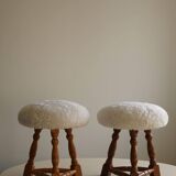 Modern Danish, a pair of tripod stools, seats reupholstered in lambswool, 1950s.