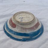 Hand-painted plate decorated with a colorful face 60s