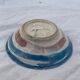 Hand-painted plate decorated with a colorful face 60s