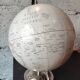 Decorative terrestrial globe on silver metal stand – explorer style