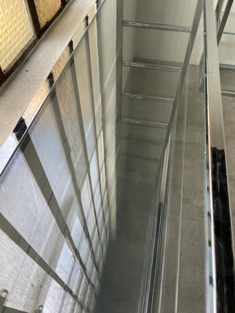 Pair of chrome and glass shelves from the 70s