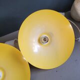 Pair of yellow lacquered metal pendant lights