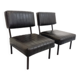 Set of 2 vintage modernist armchairs in black faux leather and metal.