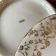 White and gold porcelain soup
