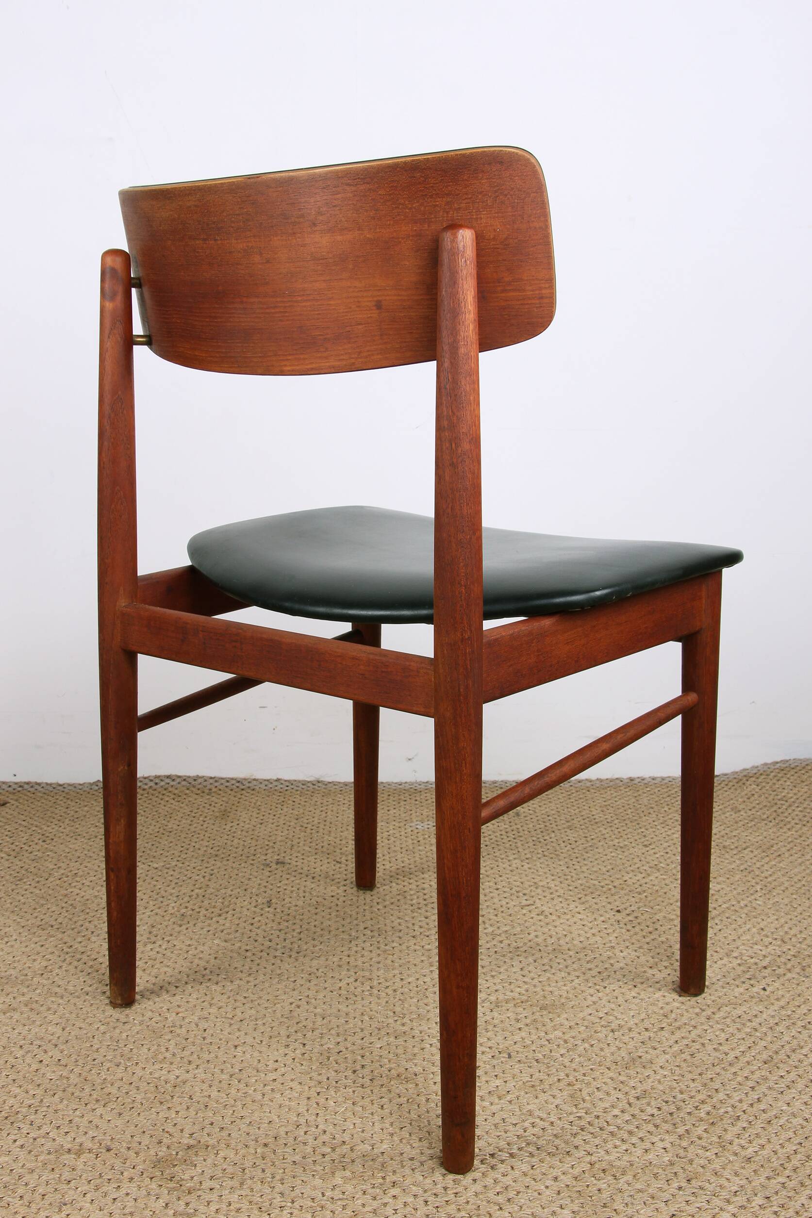 Set of 4 Danish chairs in teak, black skai and brass by Sax 1960.