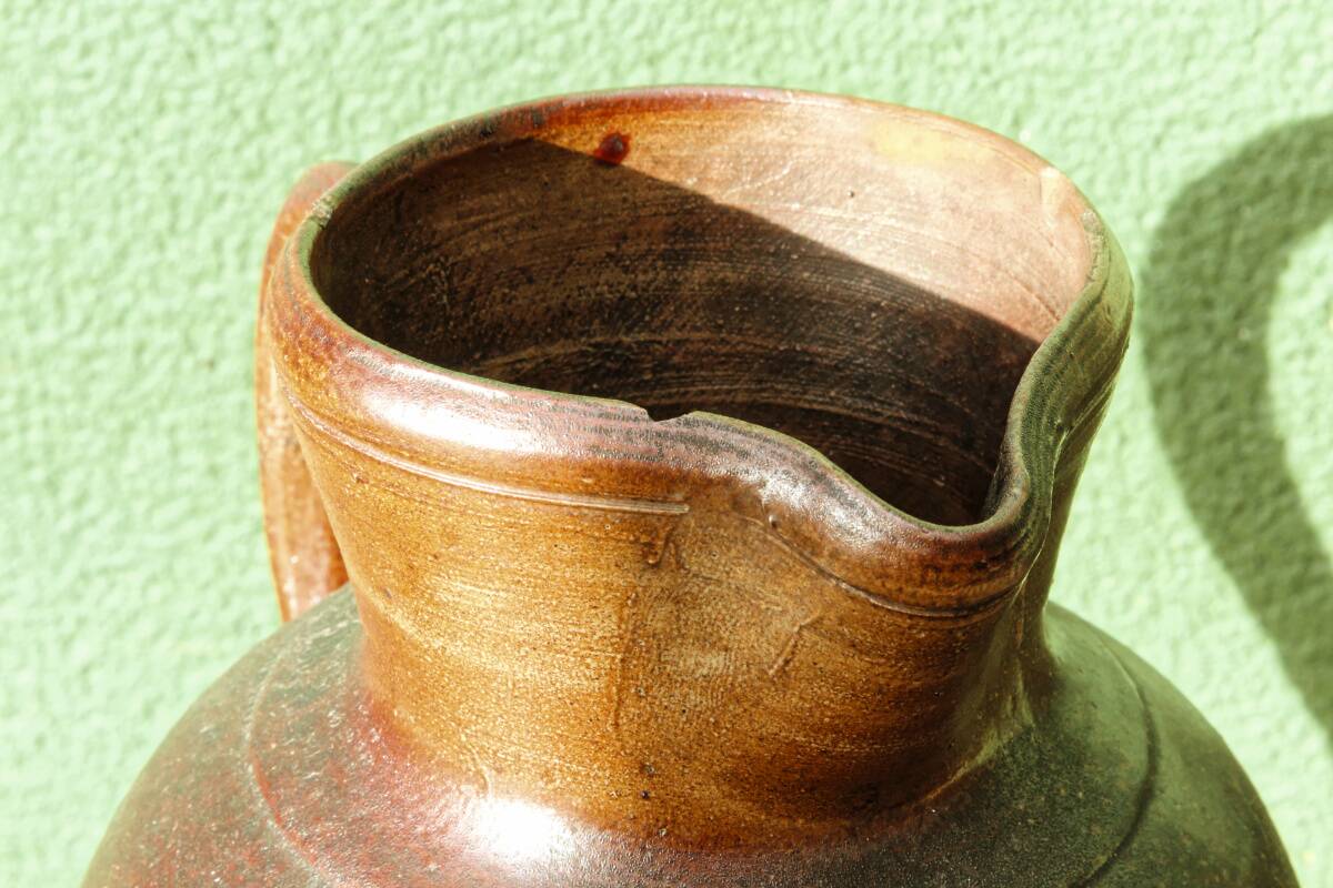 Large stoneware jug with a family name pattern, 1912