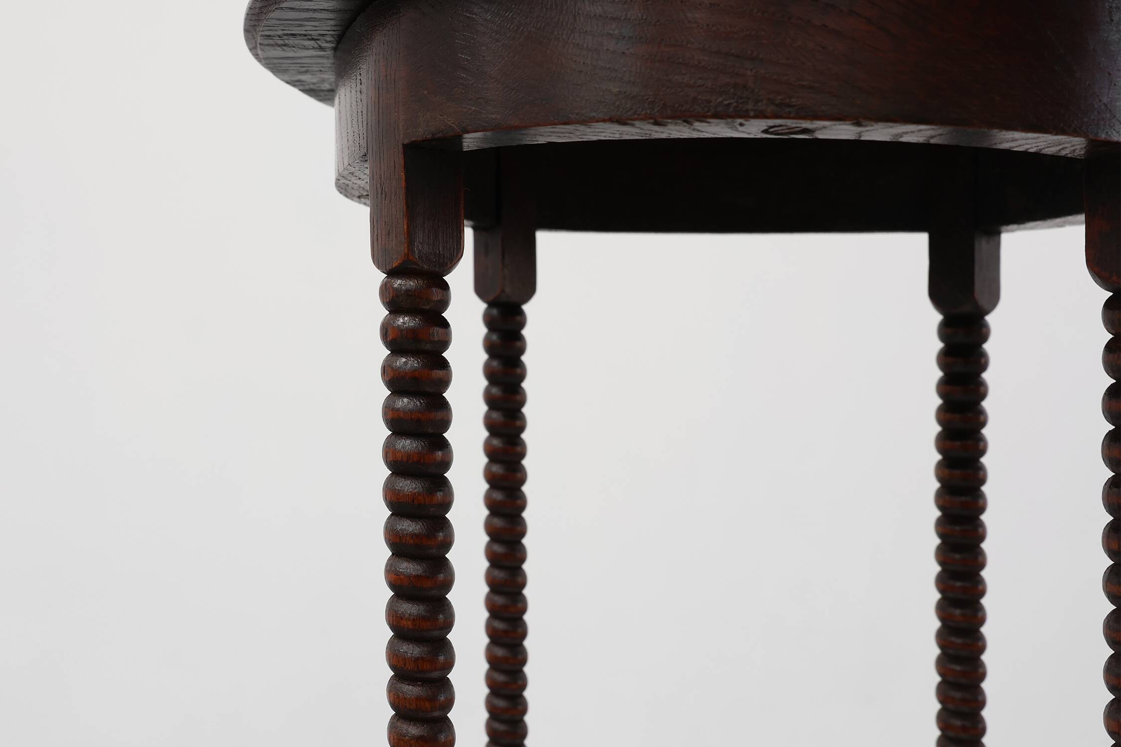 Art Deco round wooden side table with spindle legs, France circa 1900