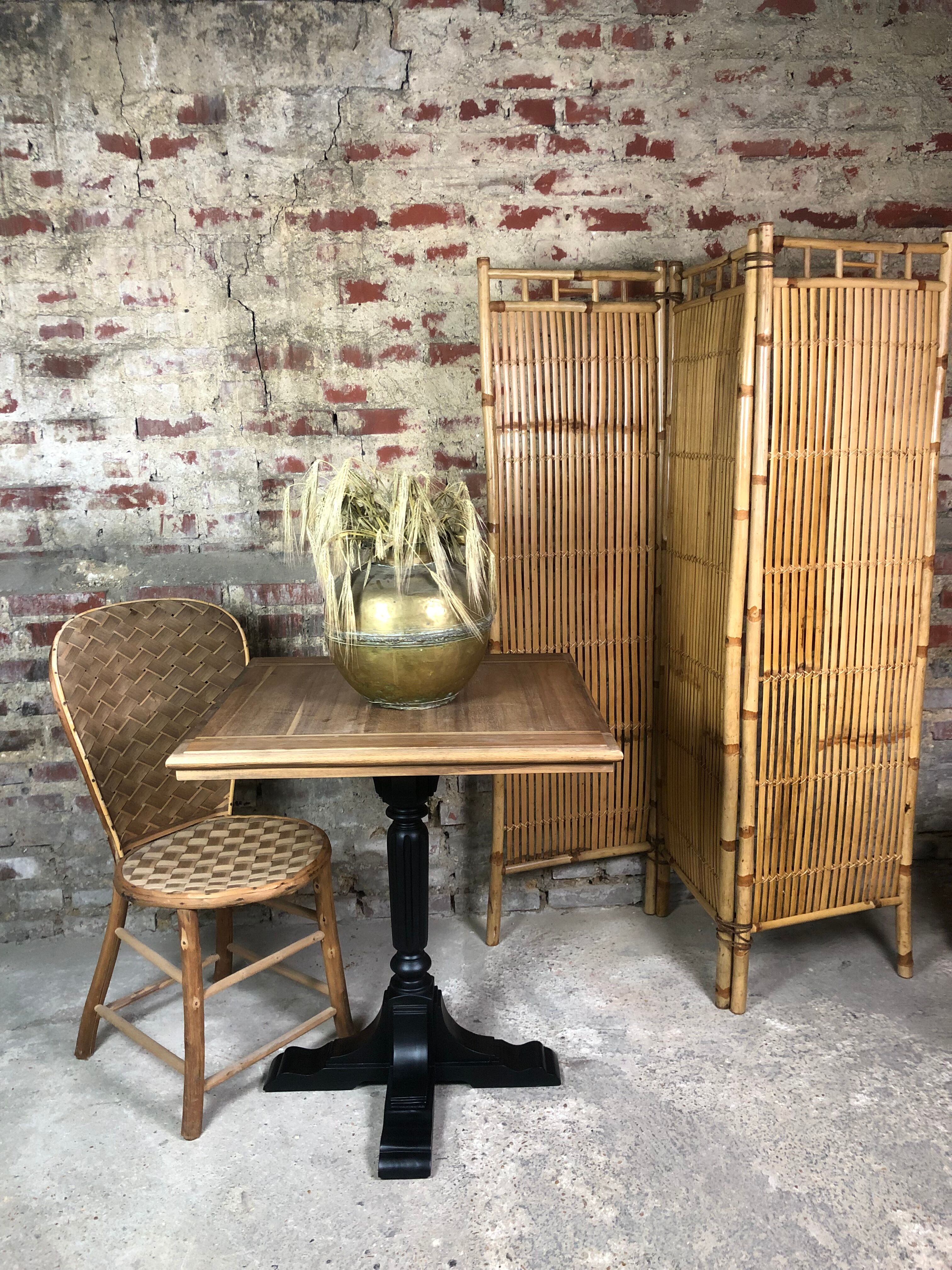 Bistro table in wood black foot and raw top