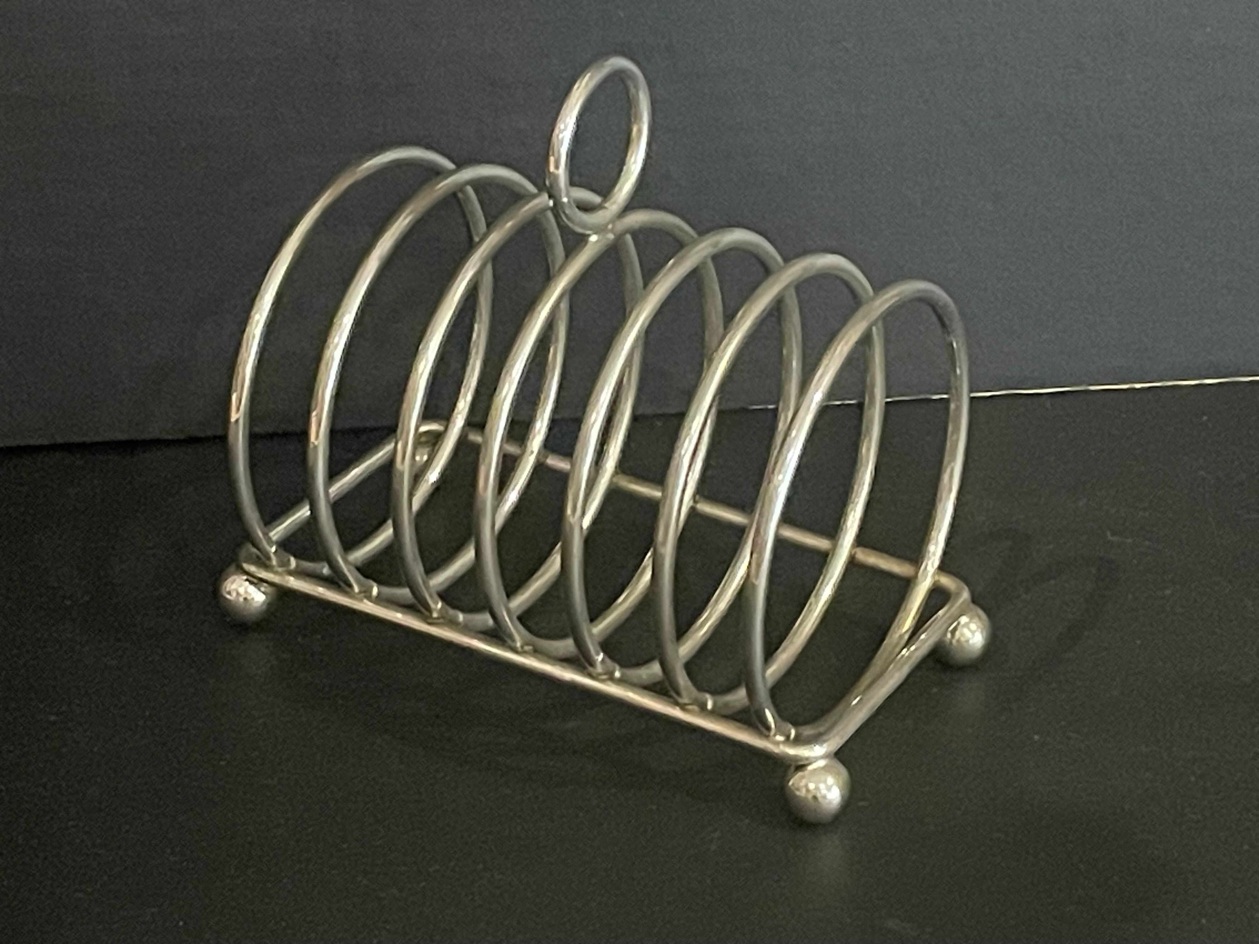 Toast holder in silver metal