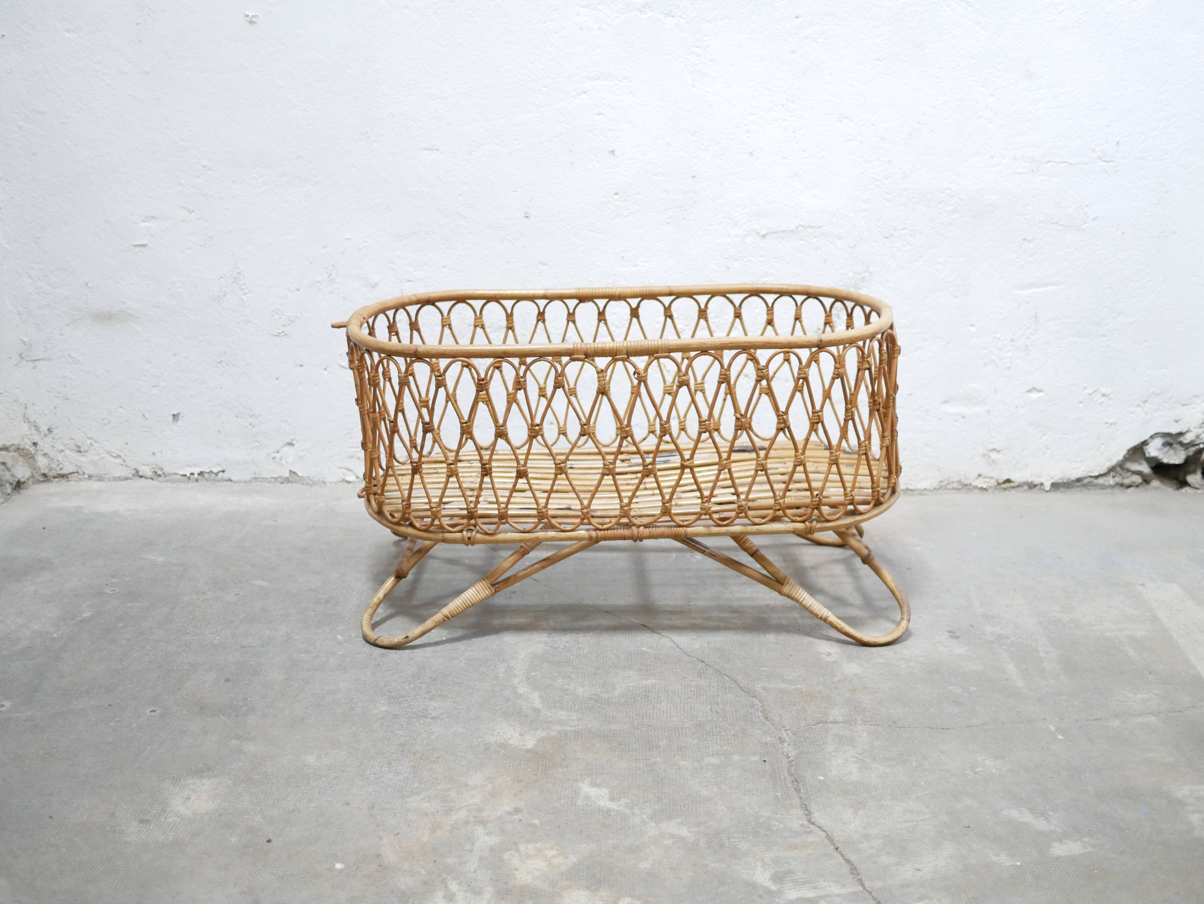 Vintage rattan cradle