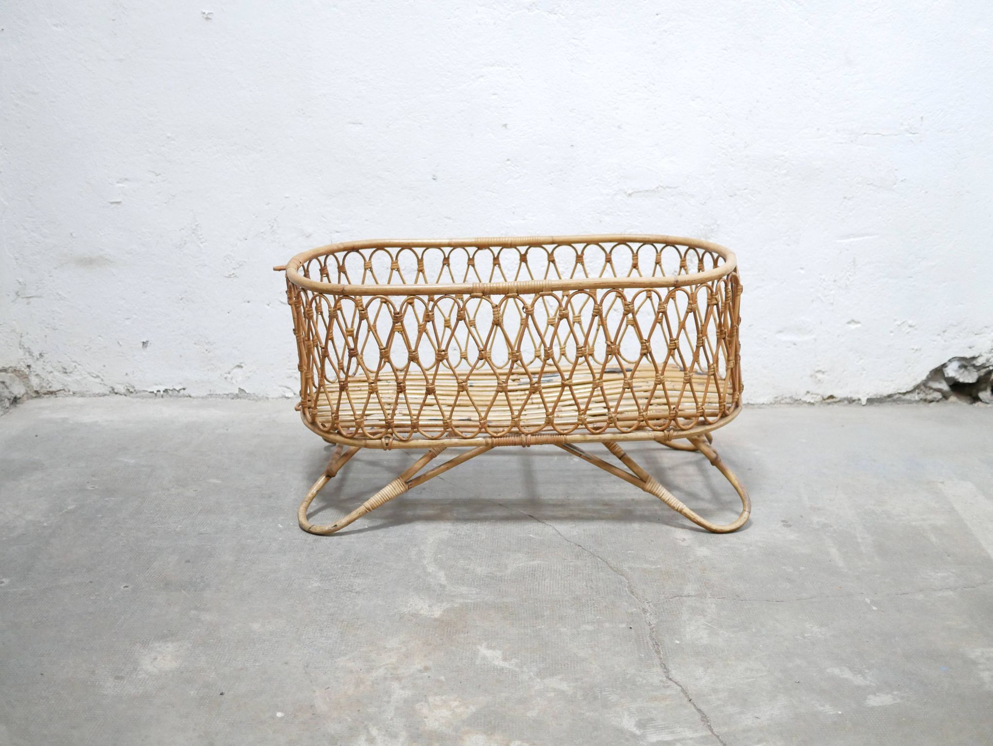 Vintage rattan cradle
