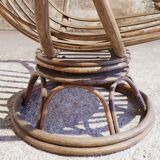 Antique swivel rattan armchair