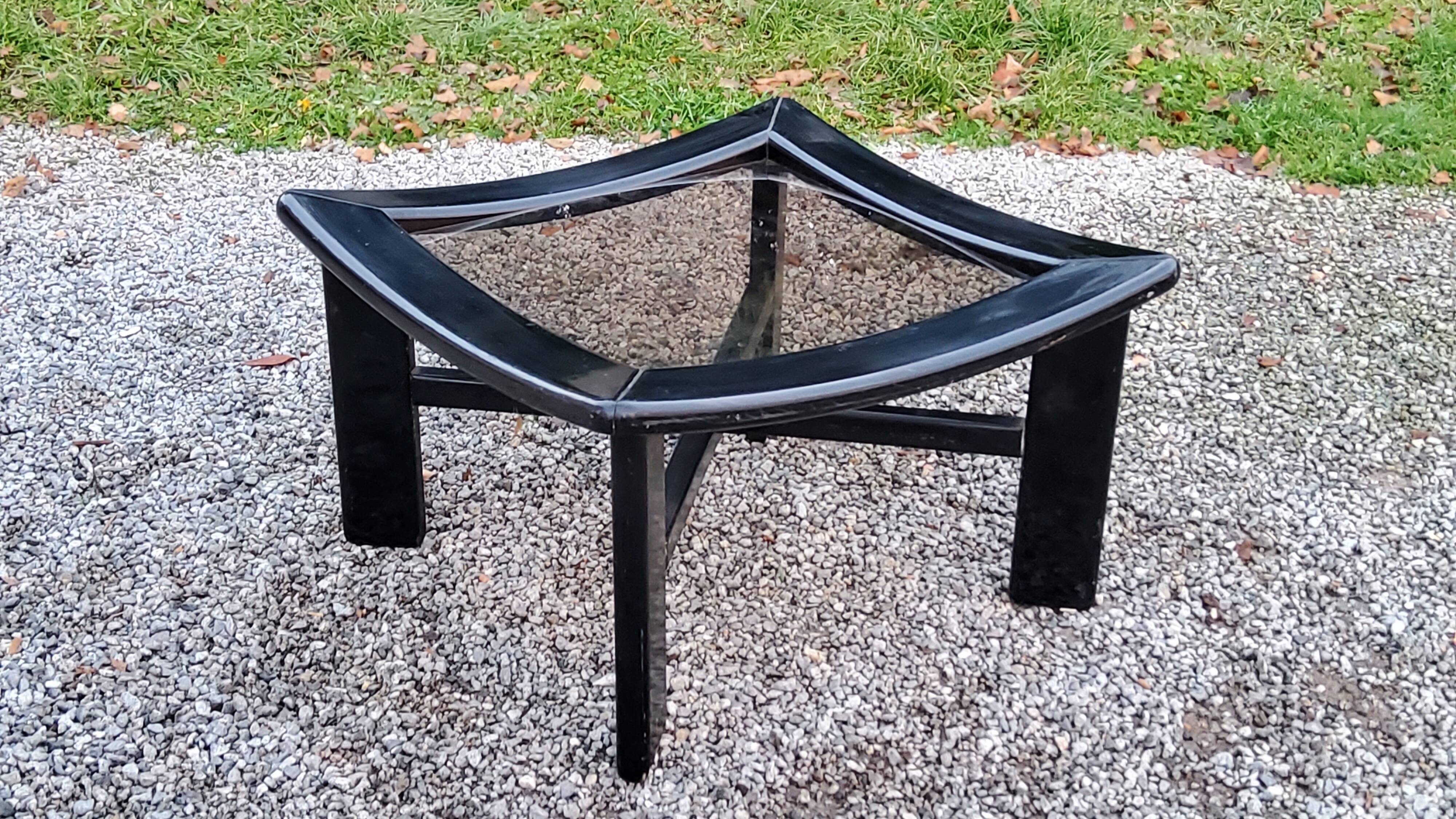70s design coffee table in black lacquered wood with smoked glass top