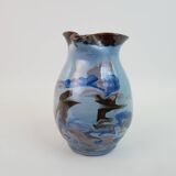 Large blue pitcher with abstract pattern
