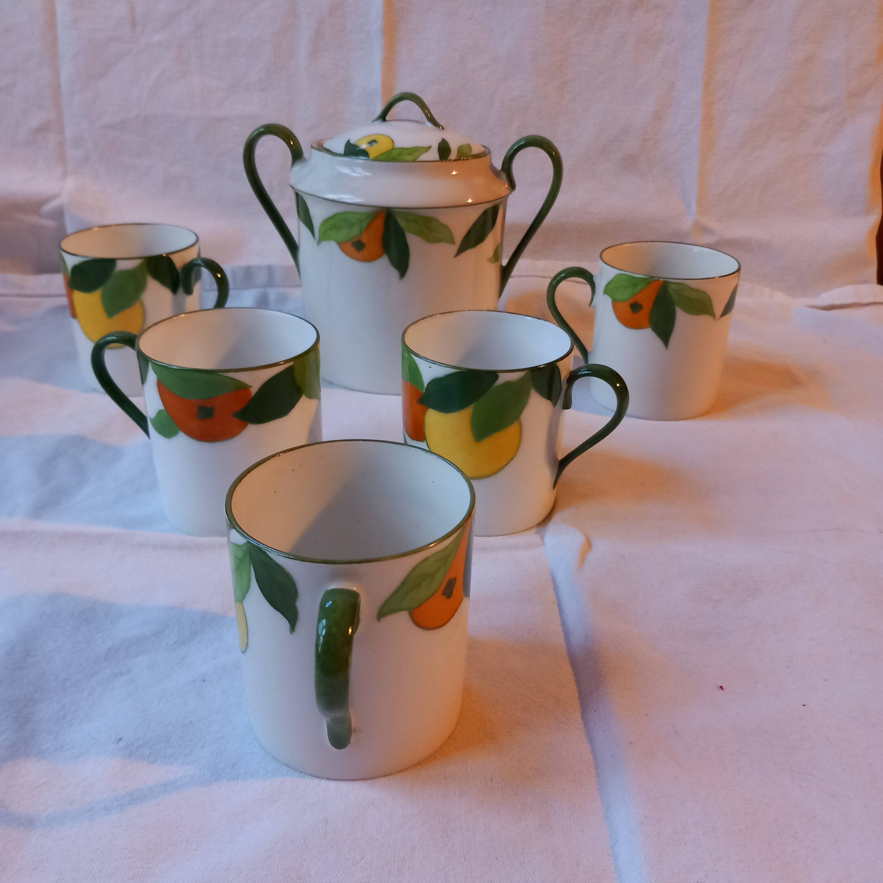 5 cups and a citrus sugar bowl, Lanternier Limoges porcelain