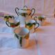 5 cups and a citrus sugar bowl, Lanternier Limoges porcelain