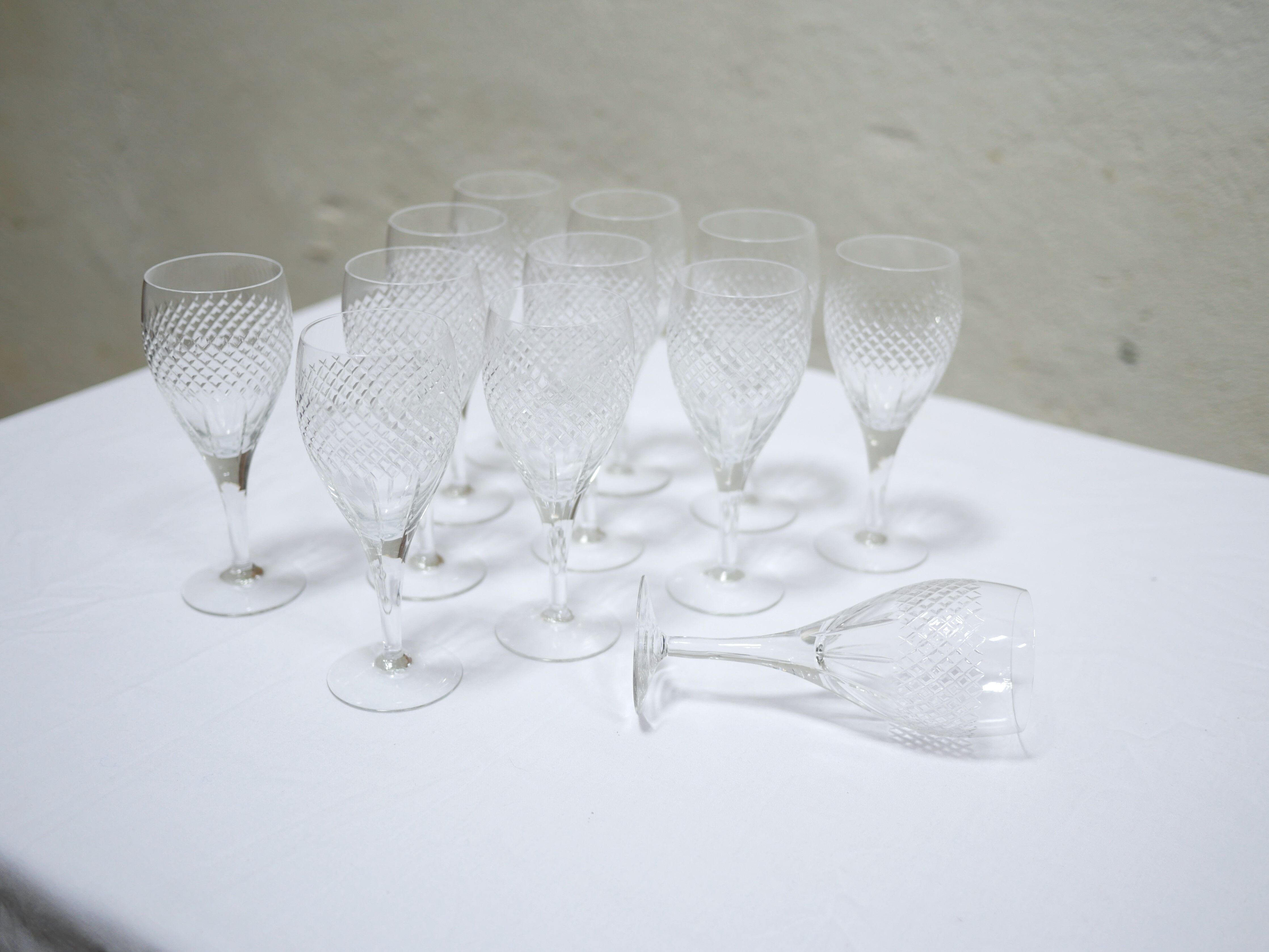 Series of 12 vintage red crystal wine glasses