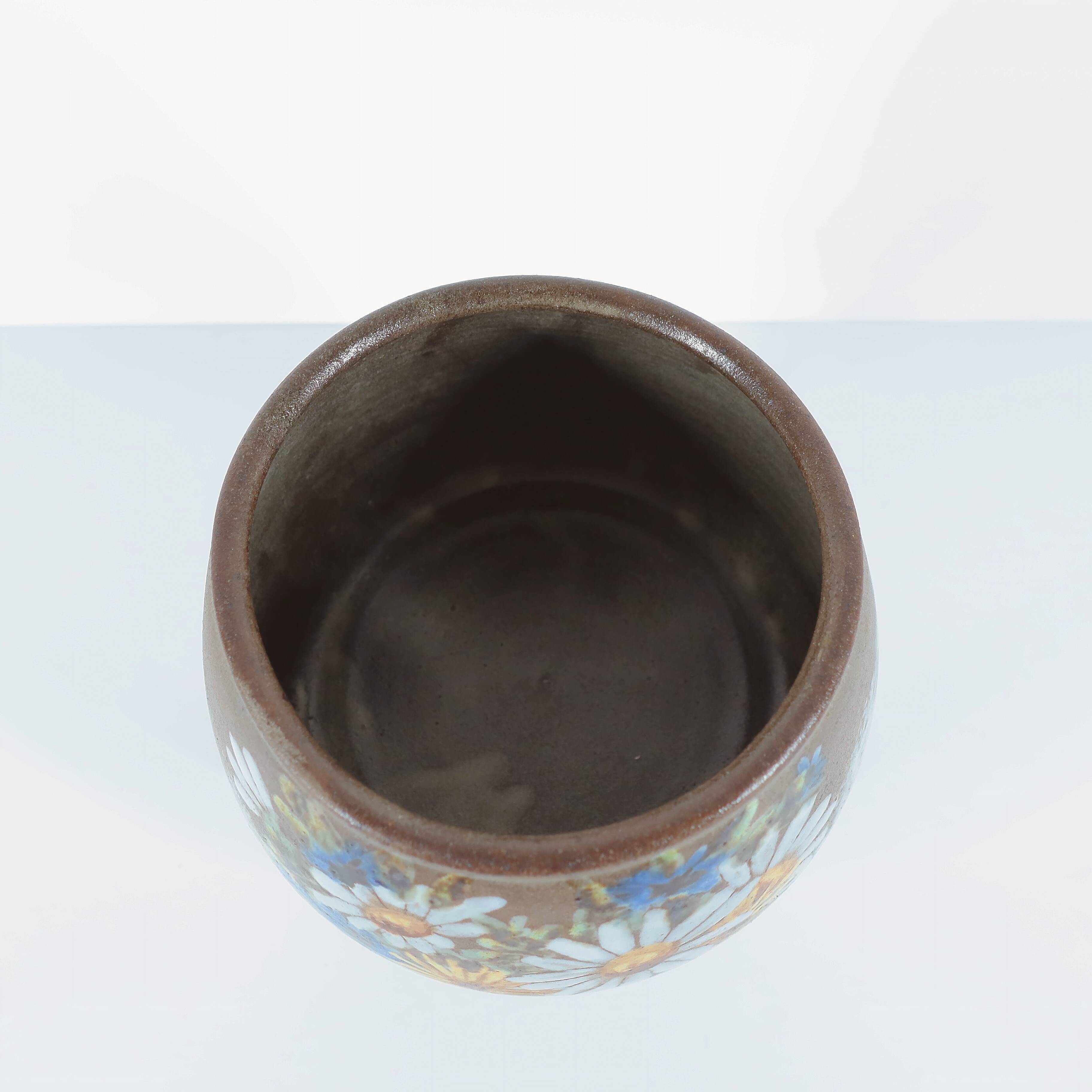 Tripod ceramic planter with floral design, signed Alexandre Kostanda, Vallauris