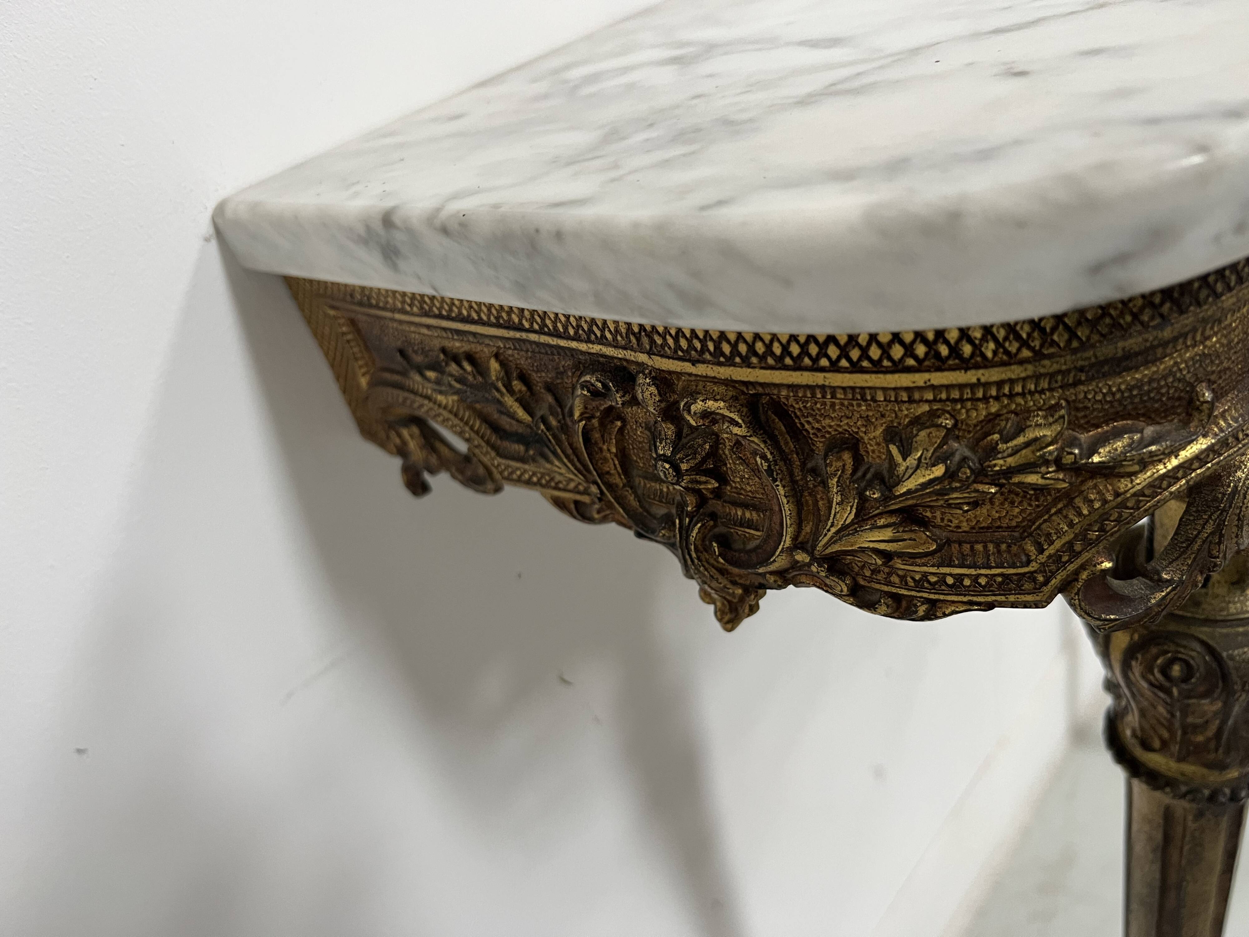 Louis XVI style console in gilded bronze, 20th century