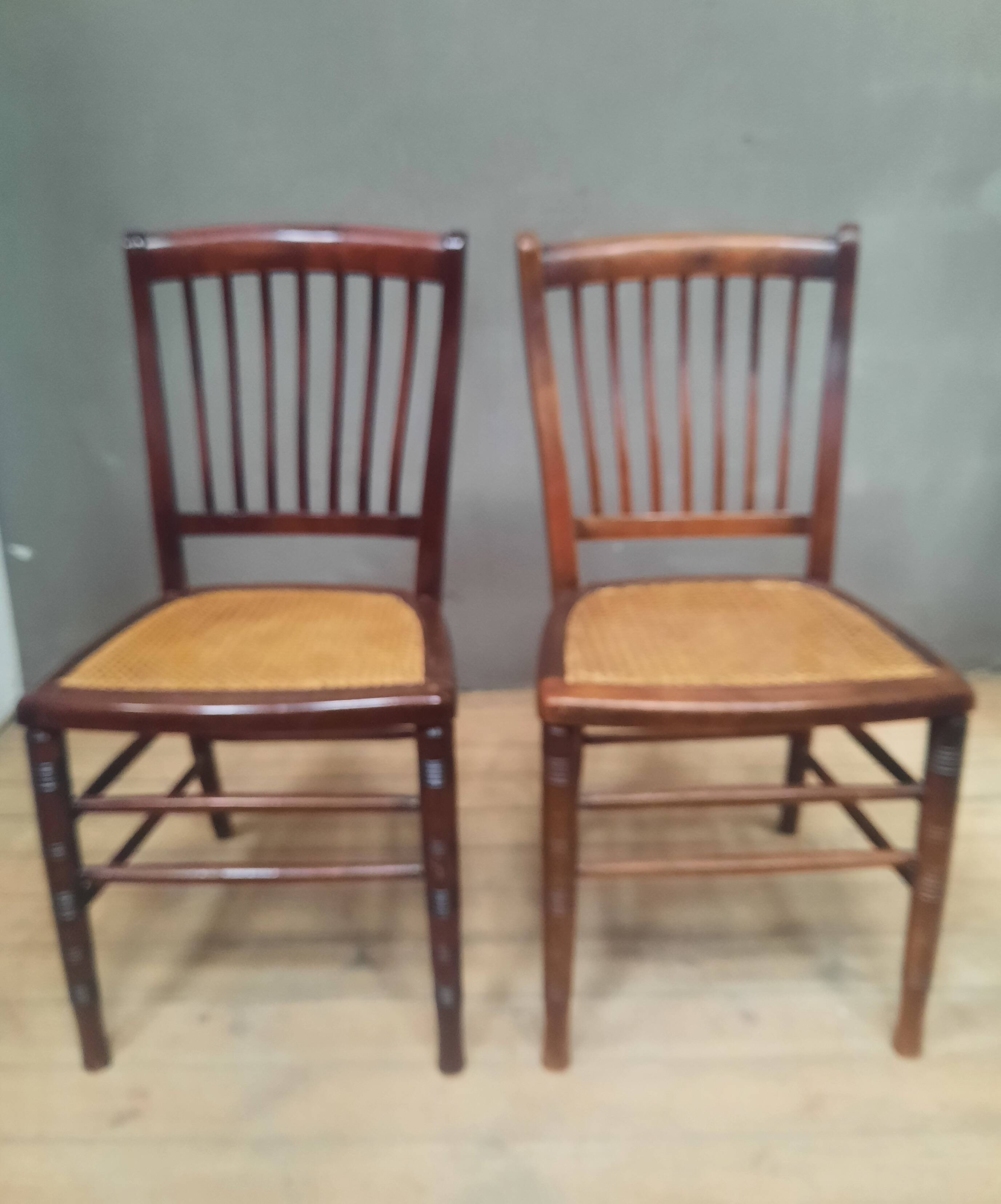 Pair of "1900" caned chairs