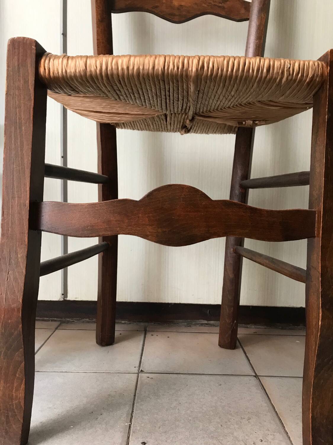 Wooden and straw chairs