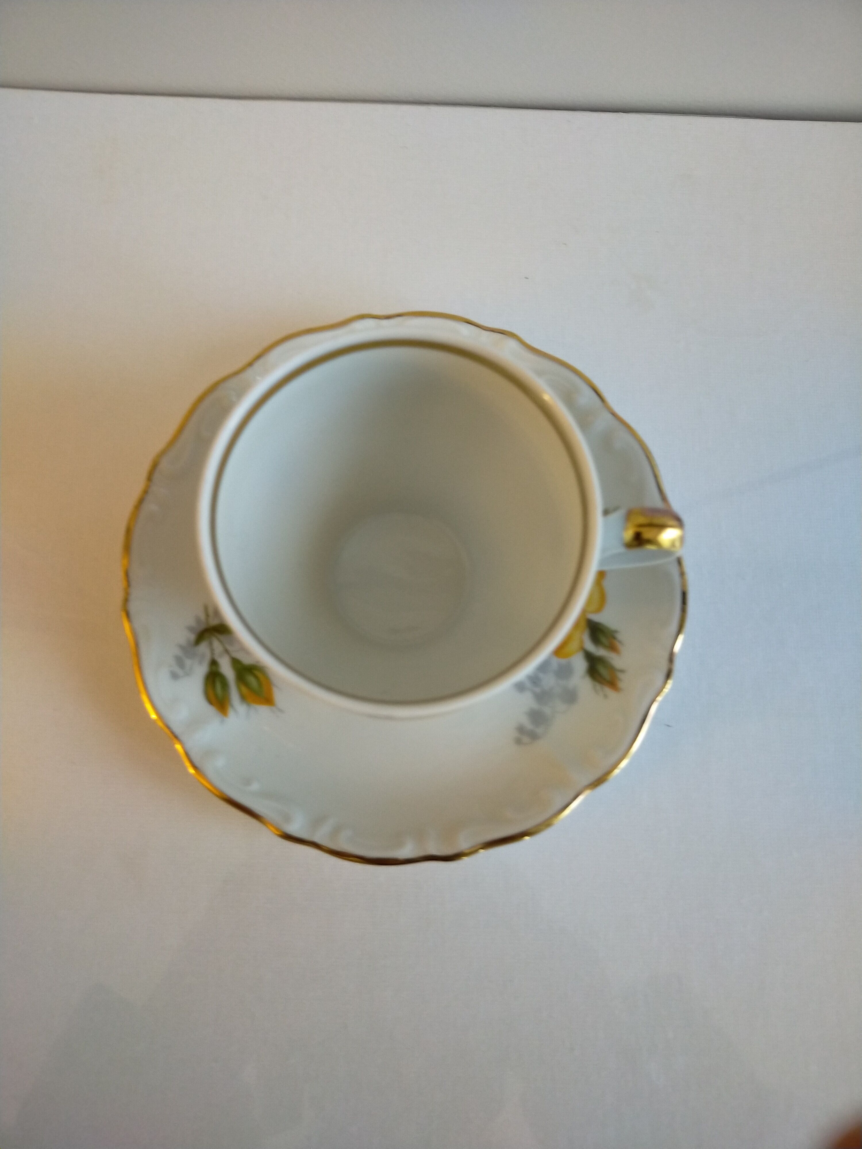 Porcelain cup and under cup