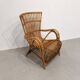 Vintage armchair from the 70s in natural rattan.