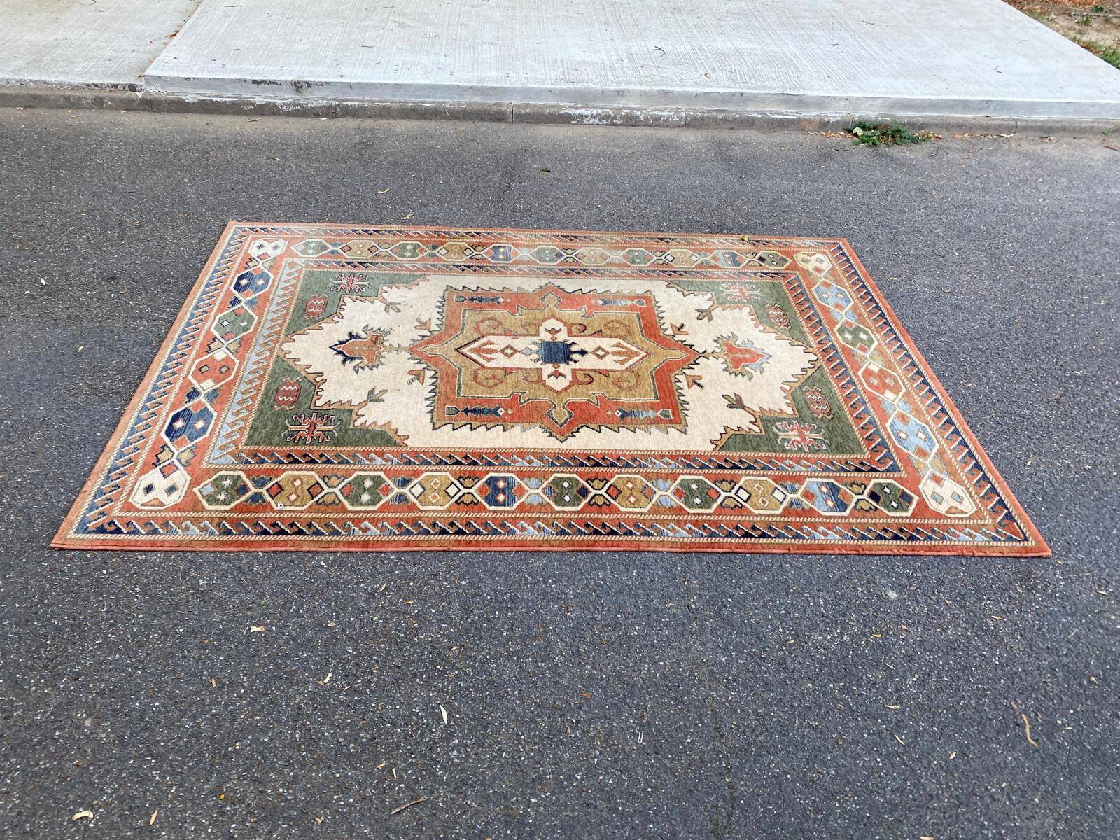 Large oriental wool rug with terracotta geometric patterns 200x300cm