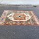 Large oriental wool rug with terracotta geometric patterns 200x300cm