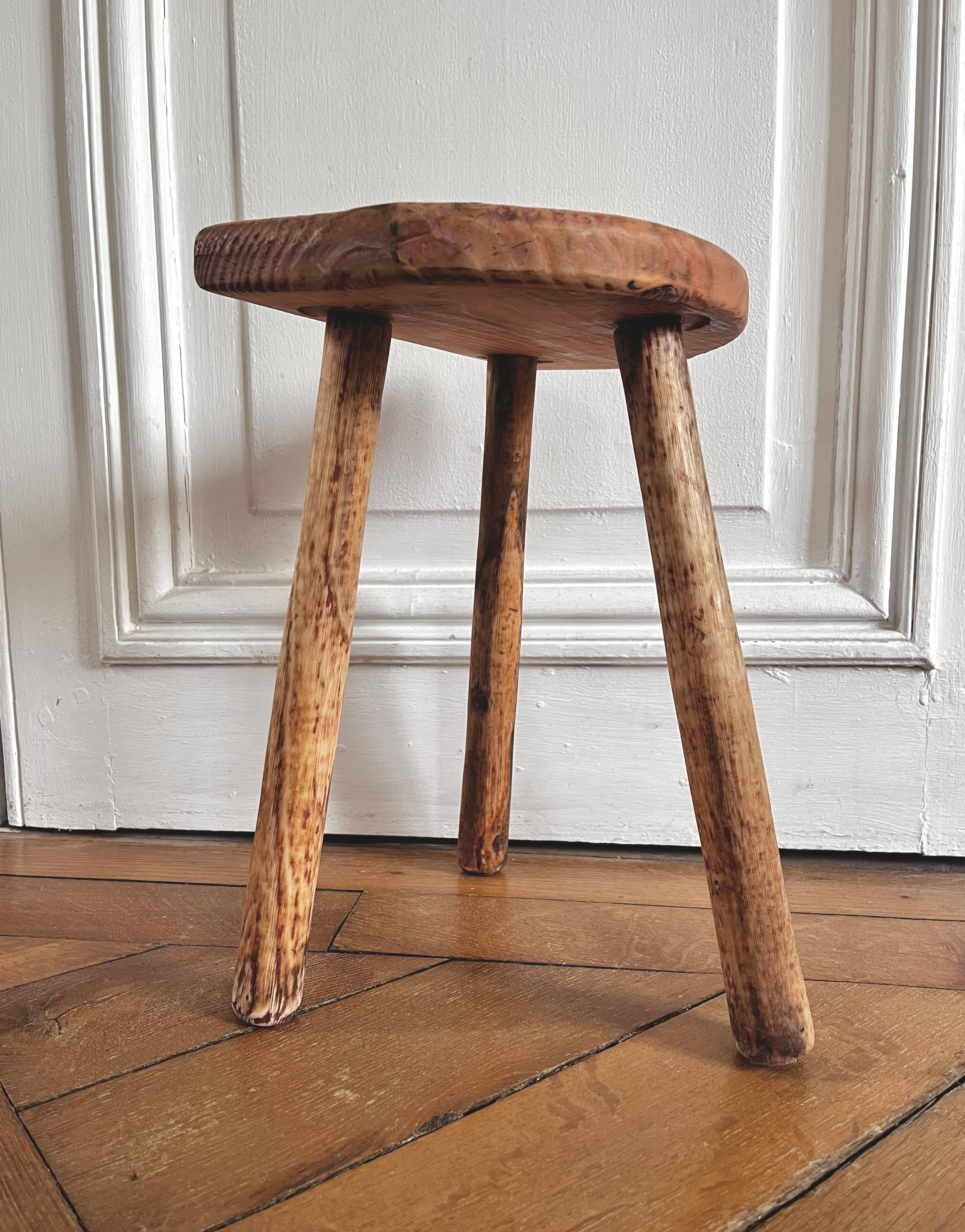 Tripod stool in raw wood