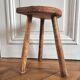 Tripod stool in raw wood