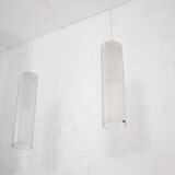 Doria pendant lights in lined frosted glass.