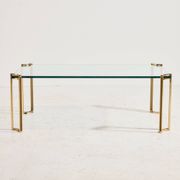 Table basse en laiton et verre